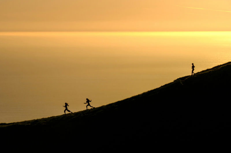 A person stretching outdoors.